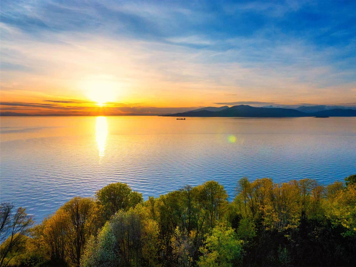 Sunset over the ocean at Wreck Beach, Vancouver.