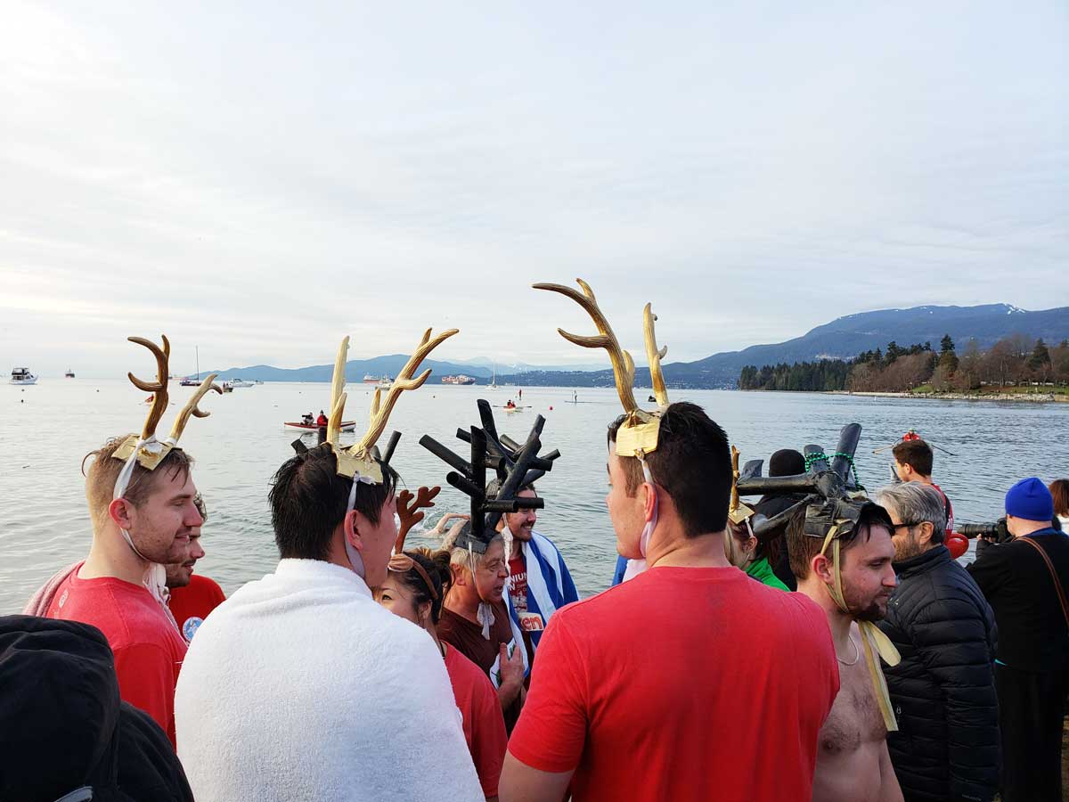 Swimmers Wearing Fun Hats at Polar Bear Swim Vancouver.