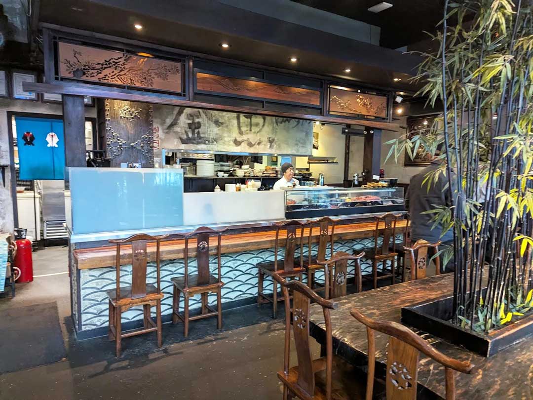 Kingyo's sushi counter with traditional wooden decor.