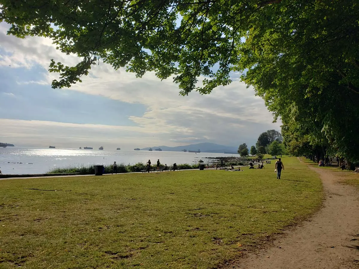 English Bay Beach Park with green space and walking pedestrian paths.