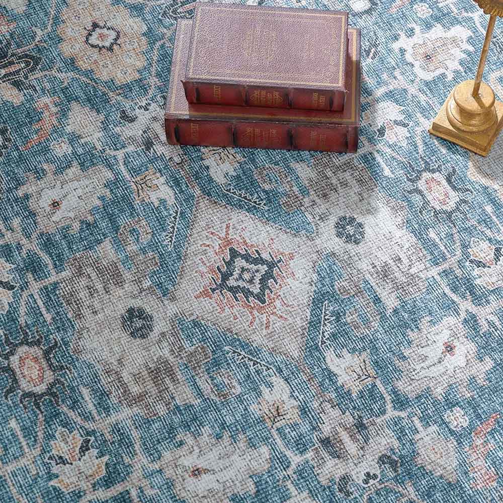 Close-Up of Blue Vintage Floral Rug Design.